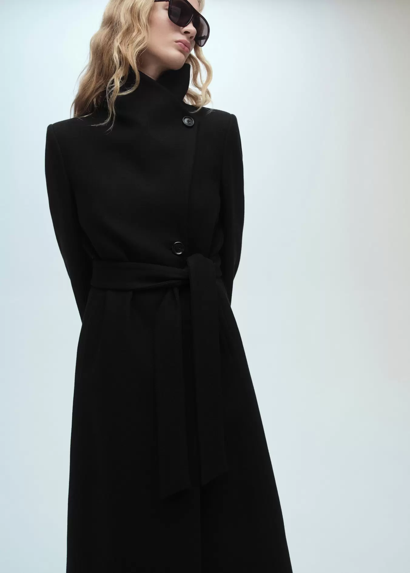 Woollen coat with belt offers at $199.99 in Mango
