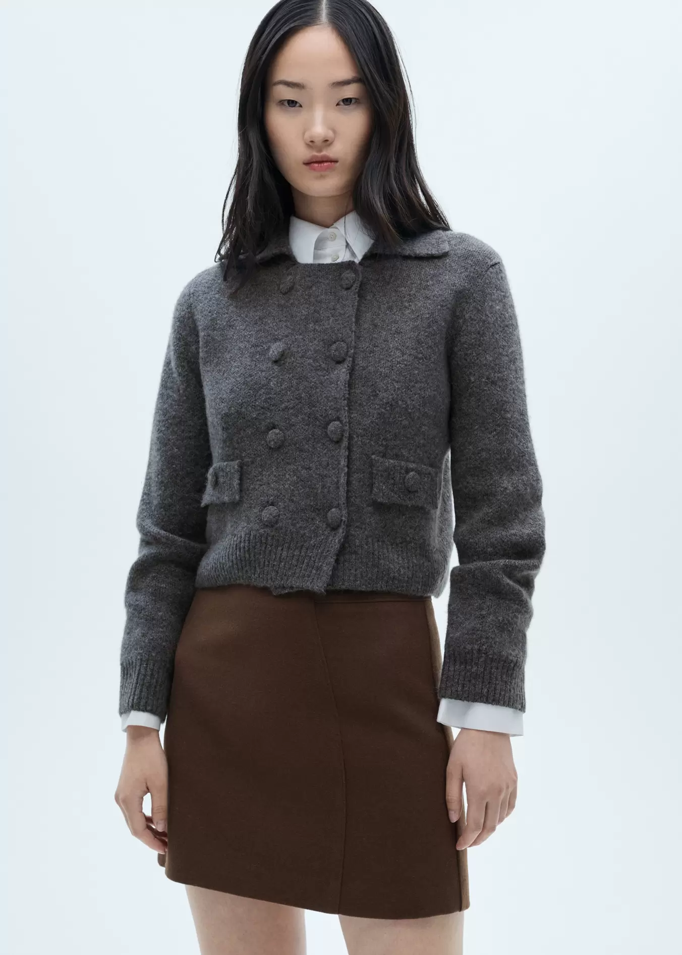 Double-breasted knitted jacket offers at $29.99 in Mango