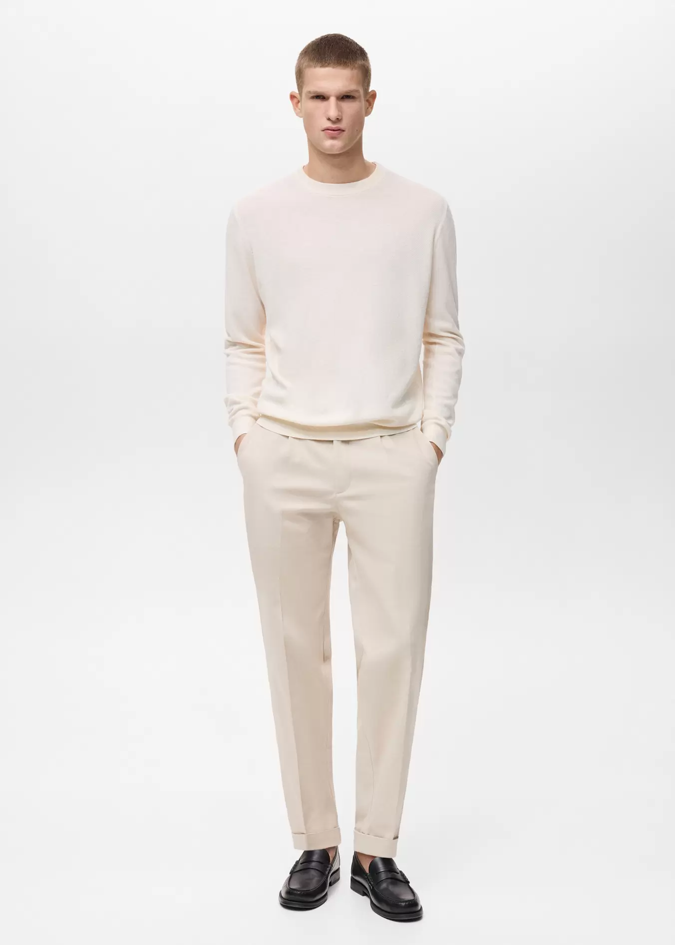 Pleated trousers under cuff offers at $59.99 in Mango